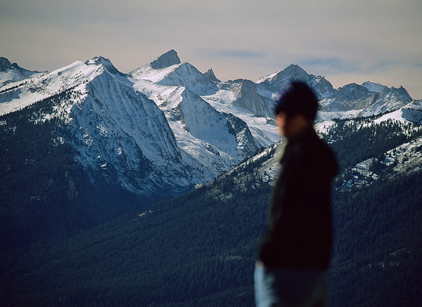 Hiker in front of the Great Western Divide at Panther Gap in Sequoia National Park