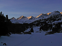 surise over snowy valley
