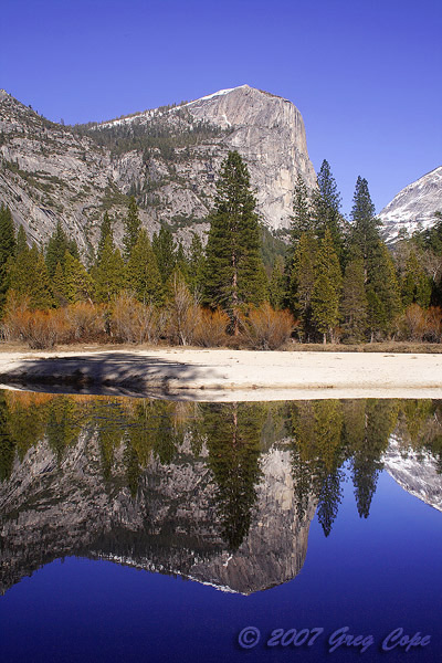Mirror Lake reflecting the high walls of Yosemite Valley and Tenaya Canyon