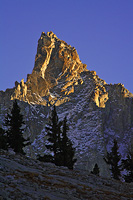 Telephoto alpenglow off a small peak in Sphinx Lakes Basin